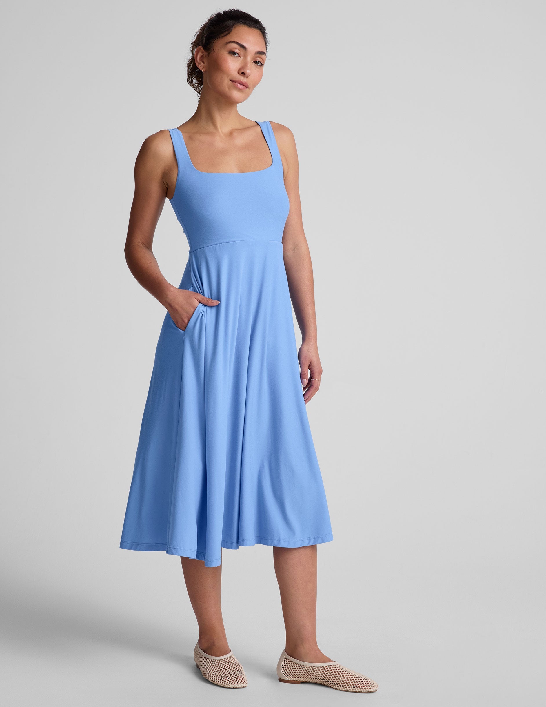 blue square neck midi length tank dress with pockets.