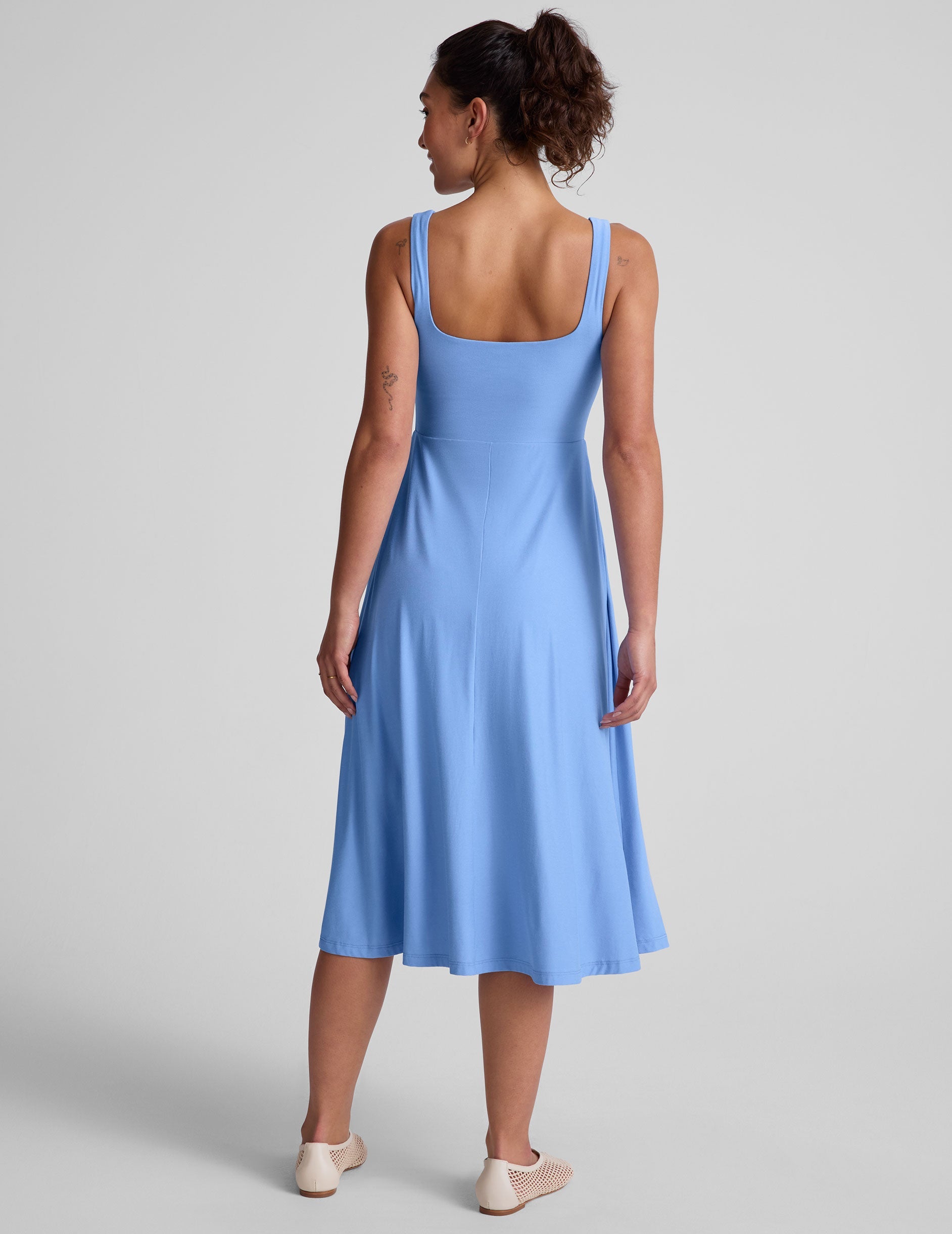 blue square neck midi length tank dress with pockets.