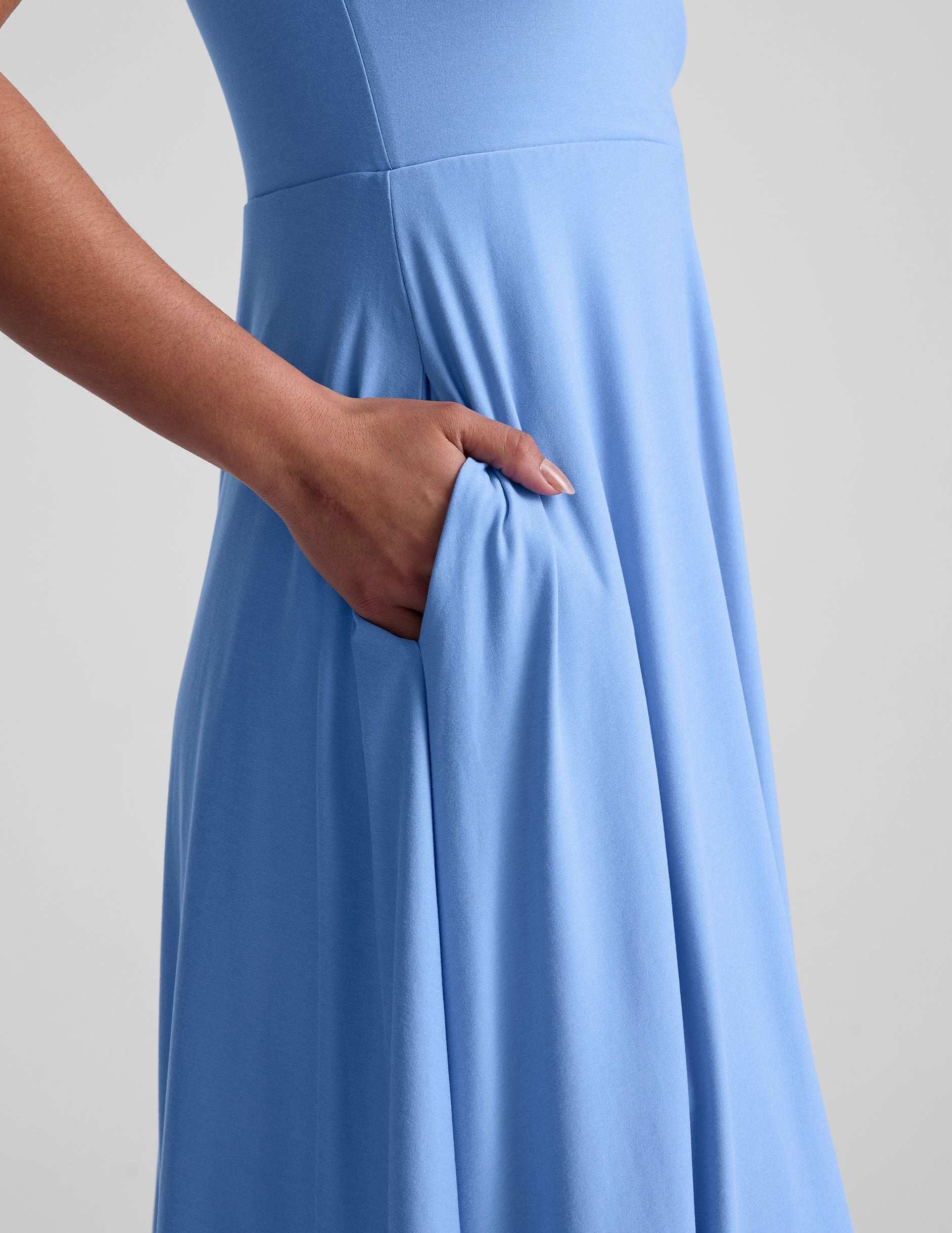 blue square neck midi length tank dress with pockets.