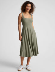 green midi length square neck dress with pockets.
