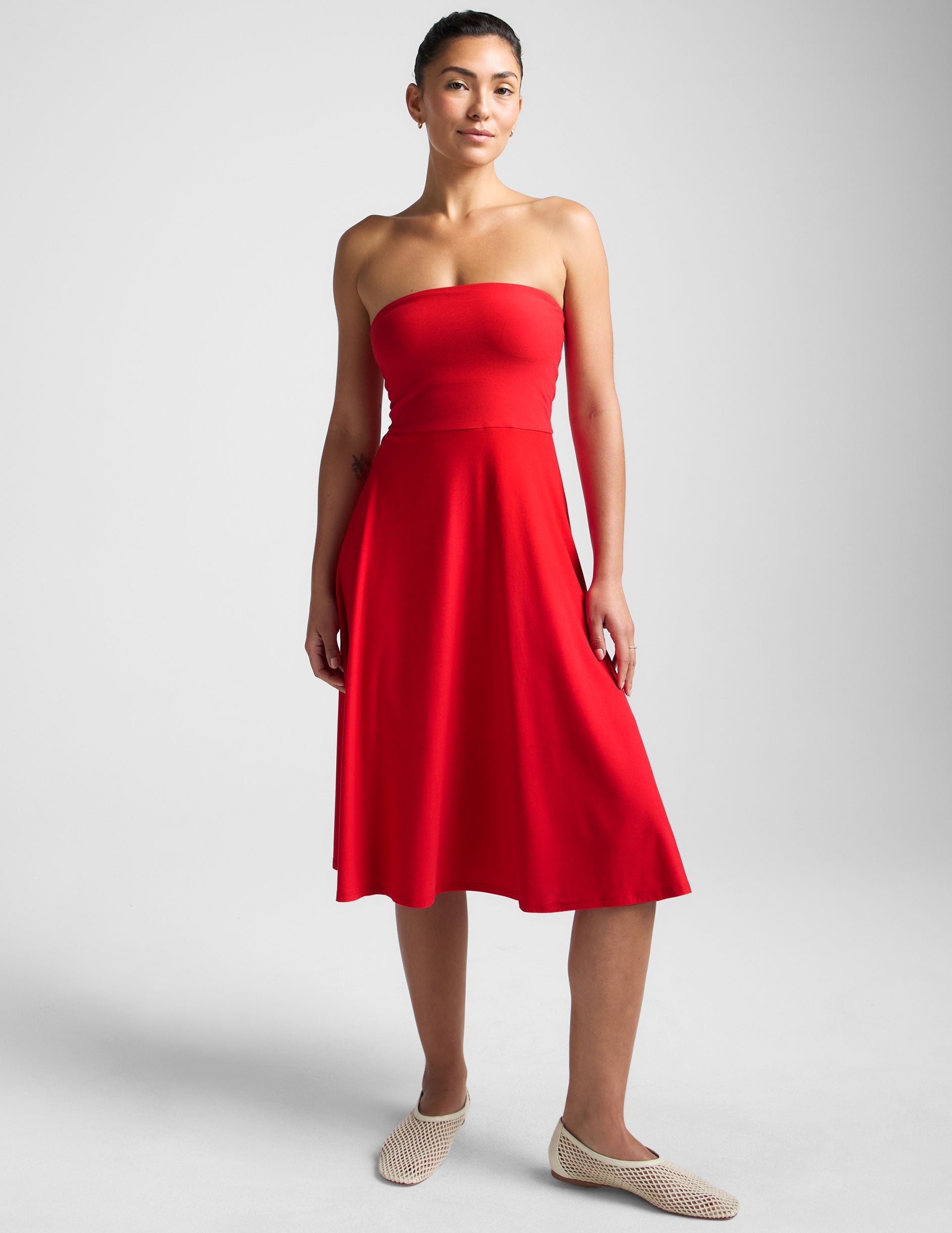 red strapless midi dress with pockets.