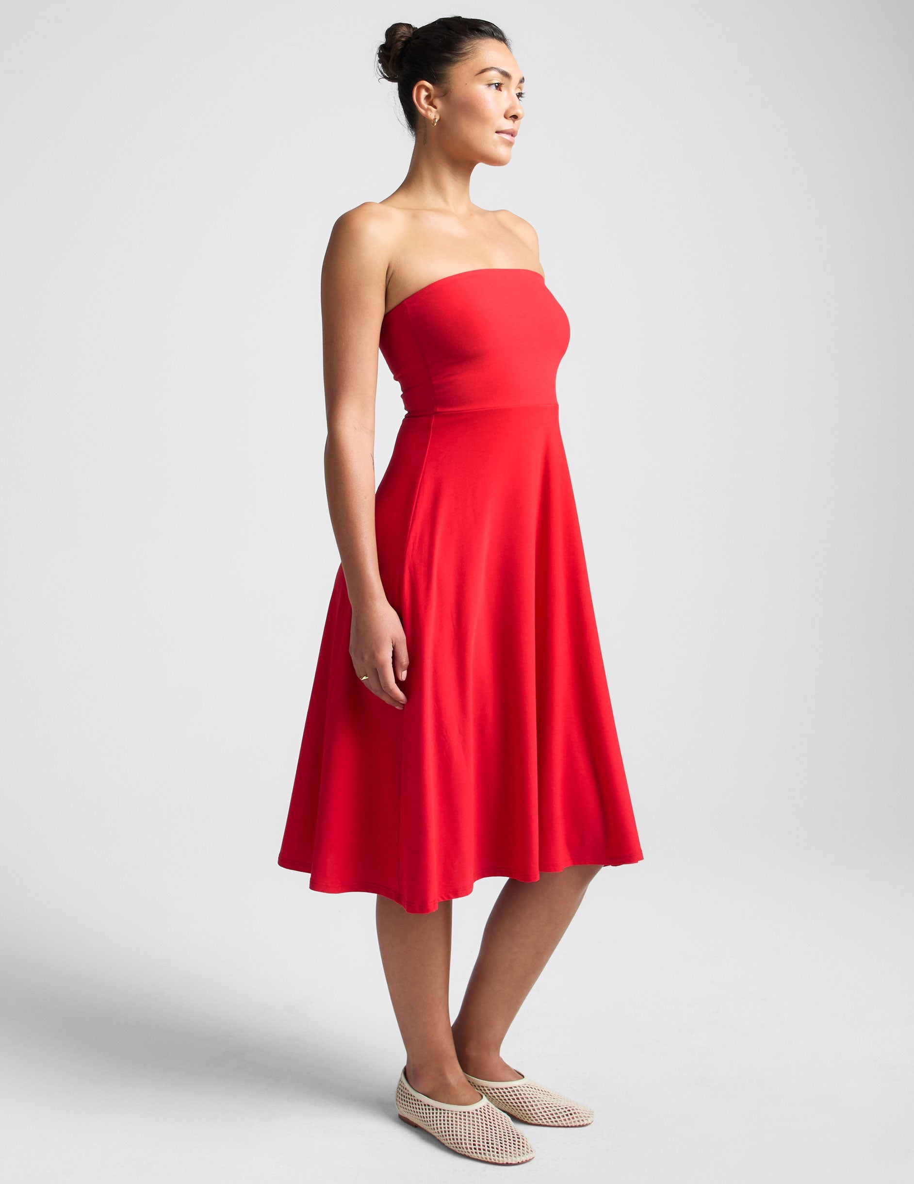 red strapless midi dress with pockets.