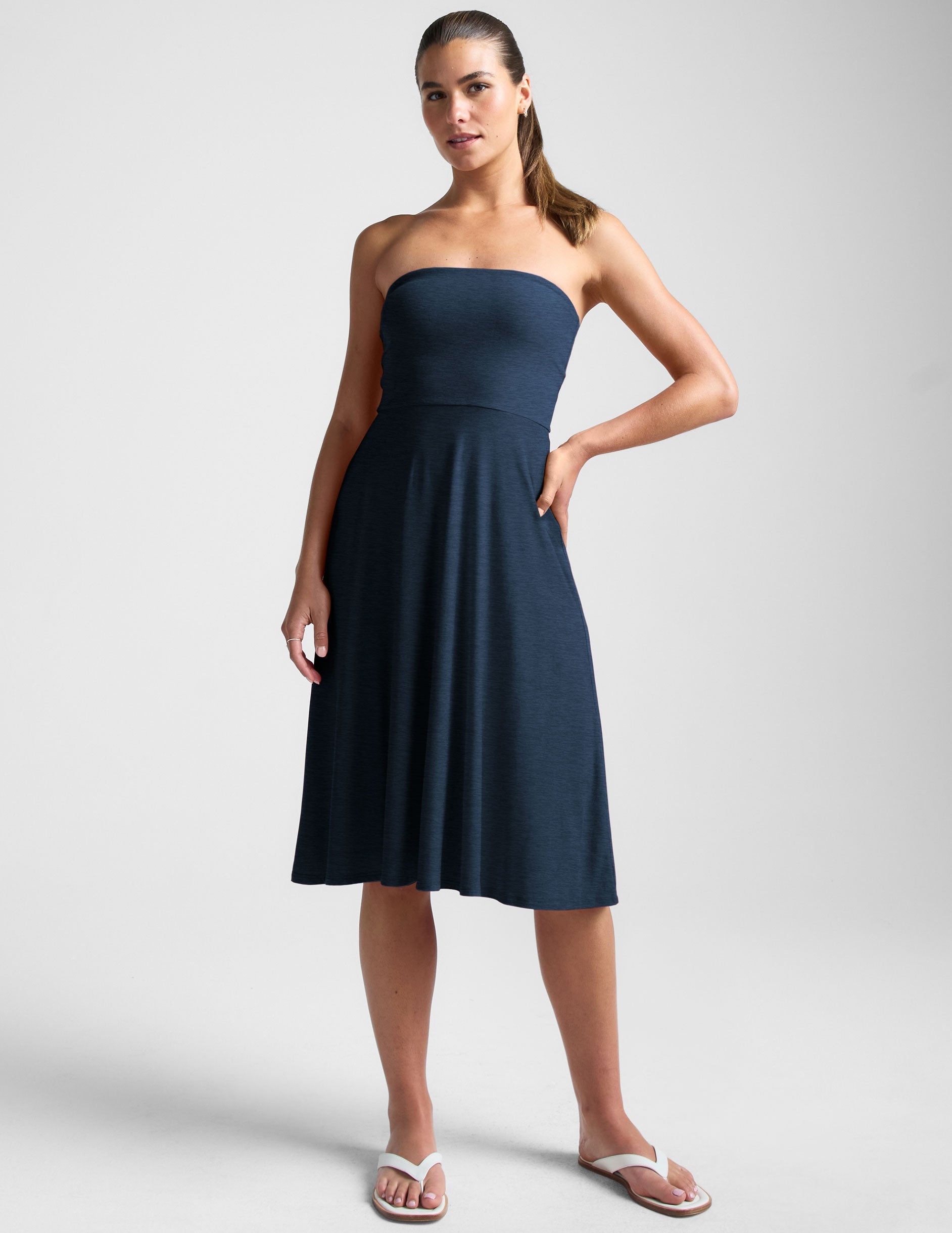 blue strapless midi dress with pockets.