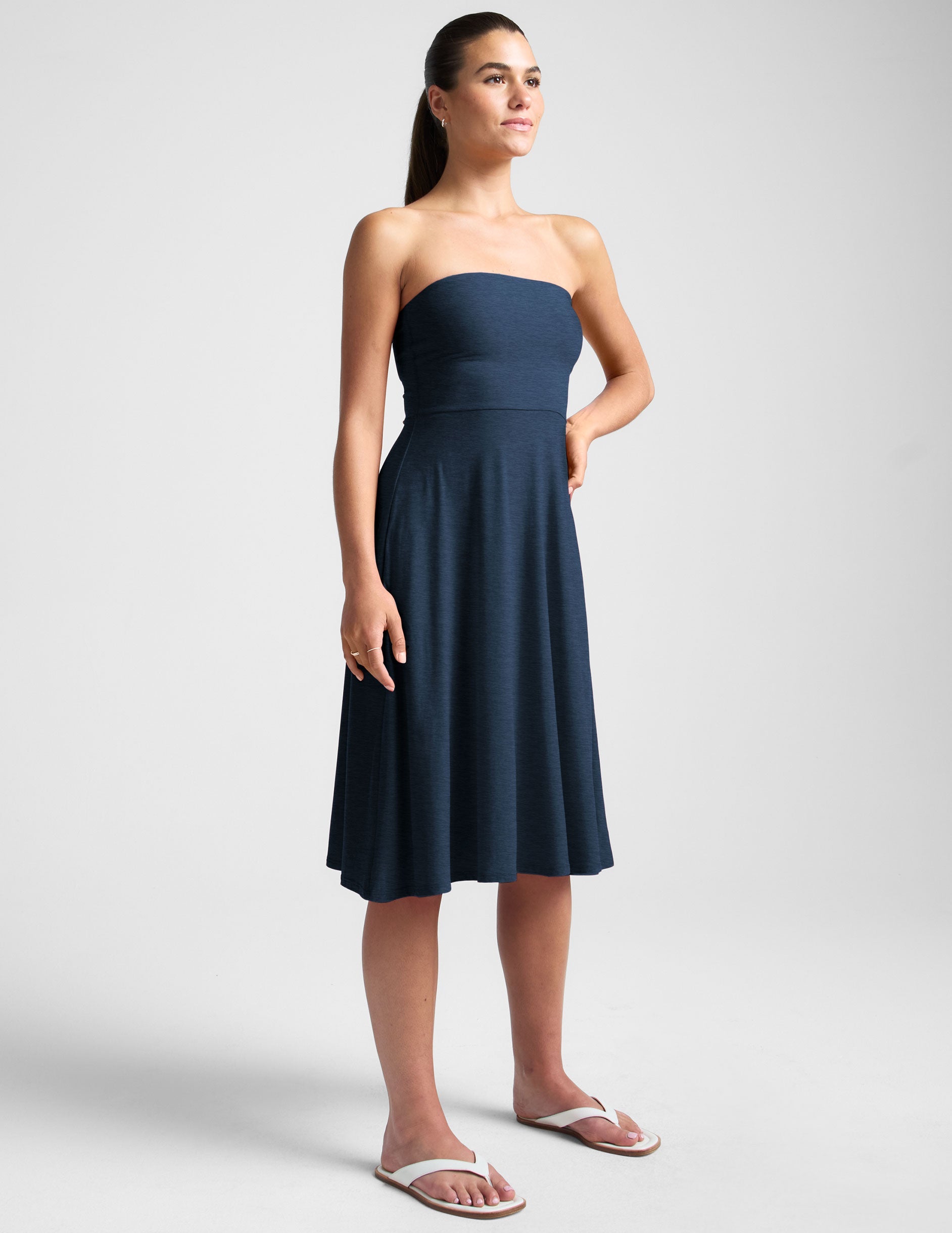 blue strapless midi dress with pockets.