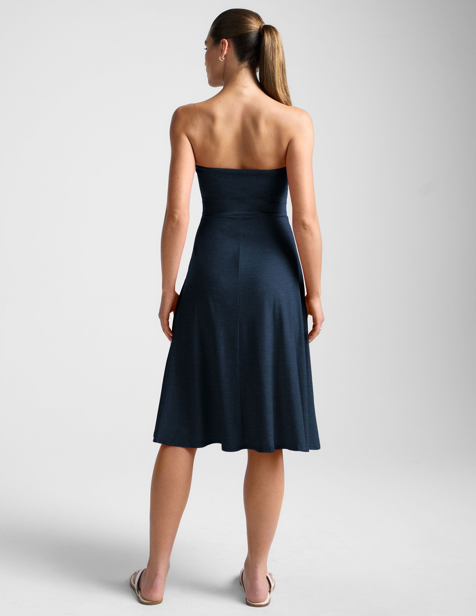 blue strapless midi dress with pockets.
