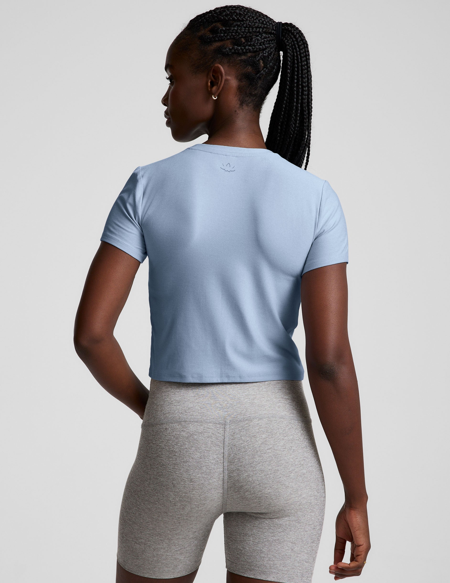 blue crew neck cropped top.