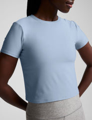blue crew neck cropped top.