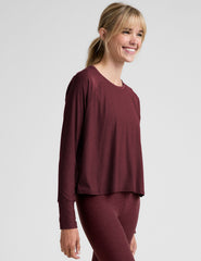 red scoop neck long sleeve relaxed fit top.