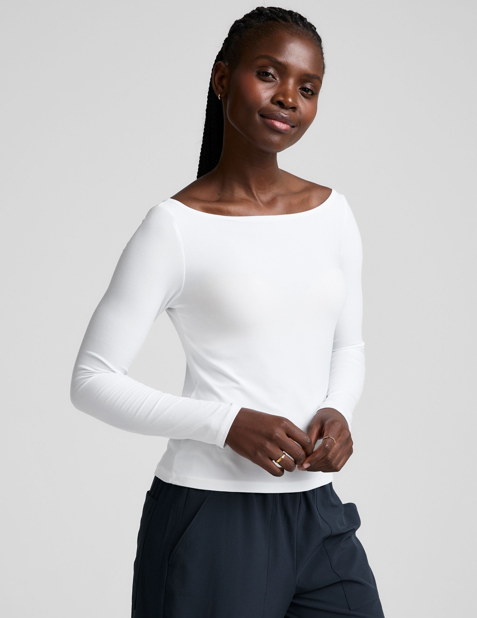 white boatneck long sleeve top.