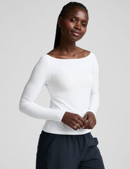 white boatneck long sleeve top.