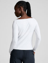 white boatneck long sleeve top.