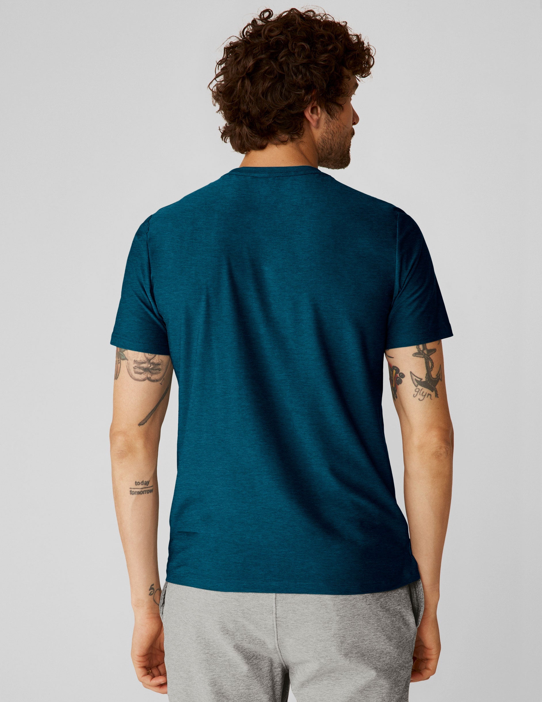 blue men's short sleeve top.