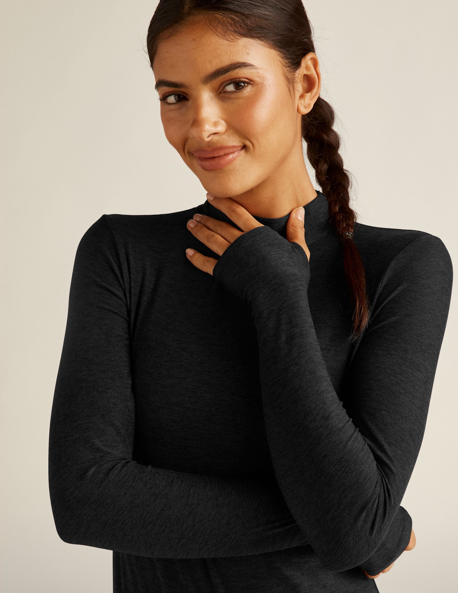 black mock neck pullover.