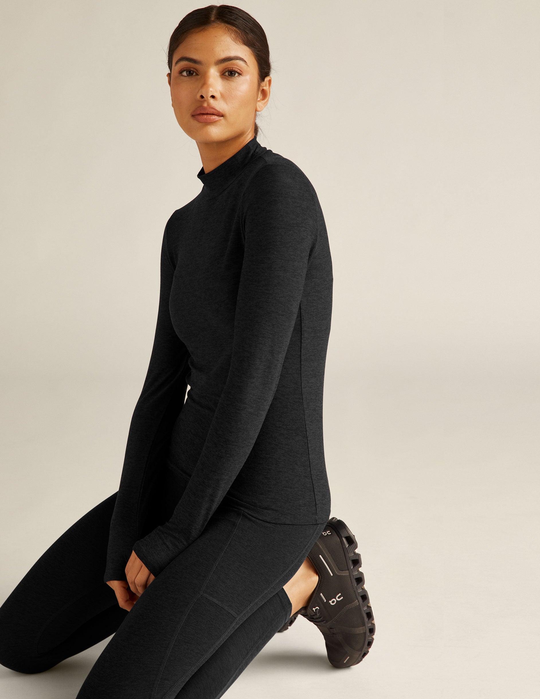 black mock neck pullover.