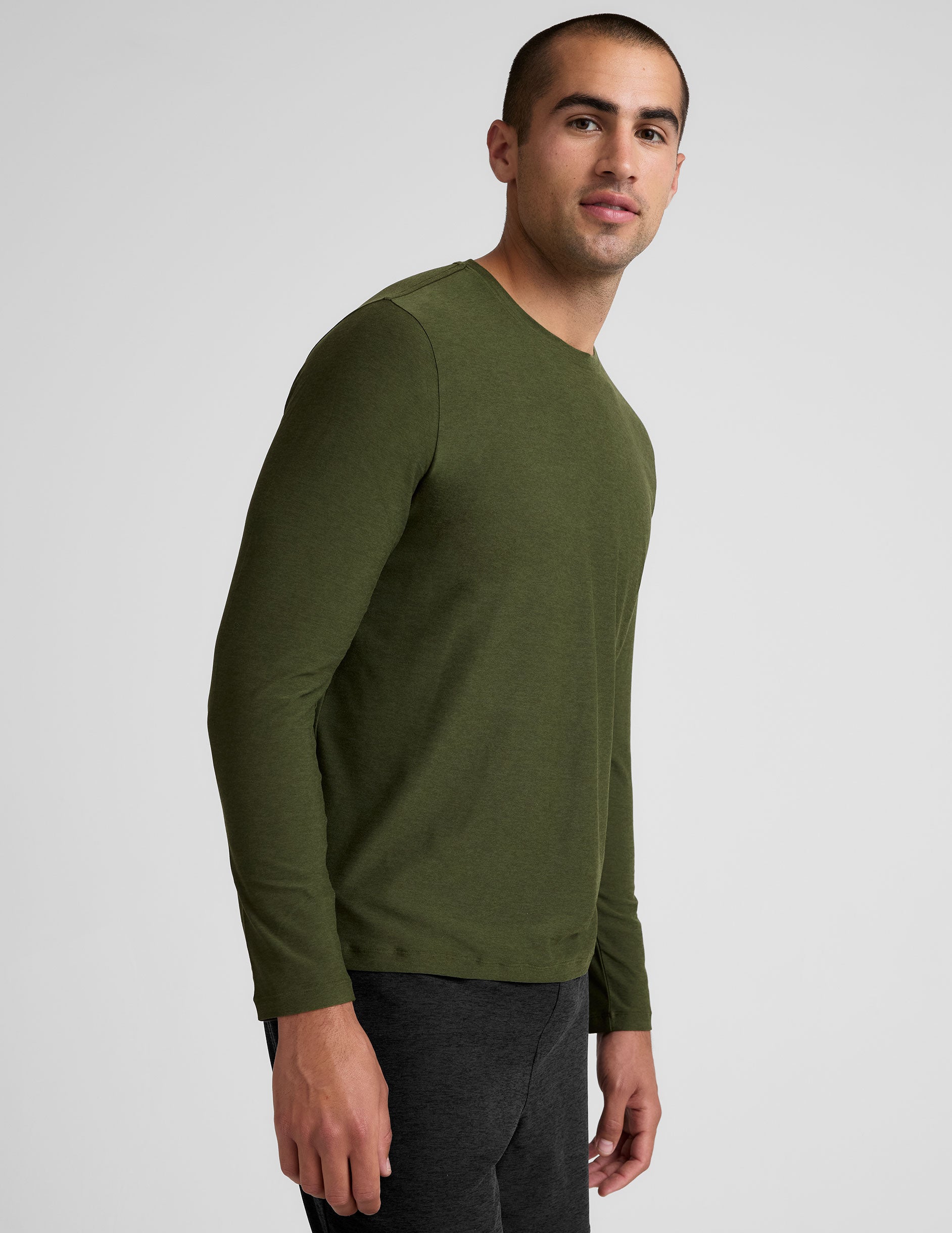 green long sleeve crew neck men's top.