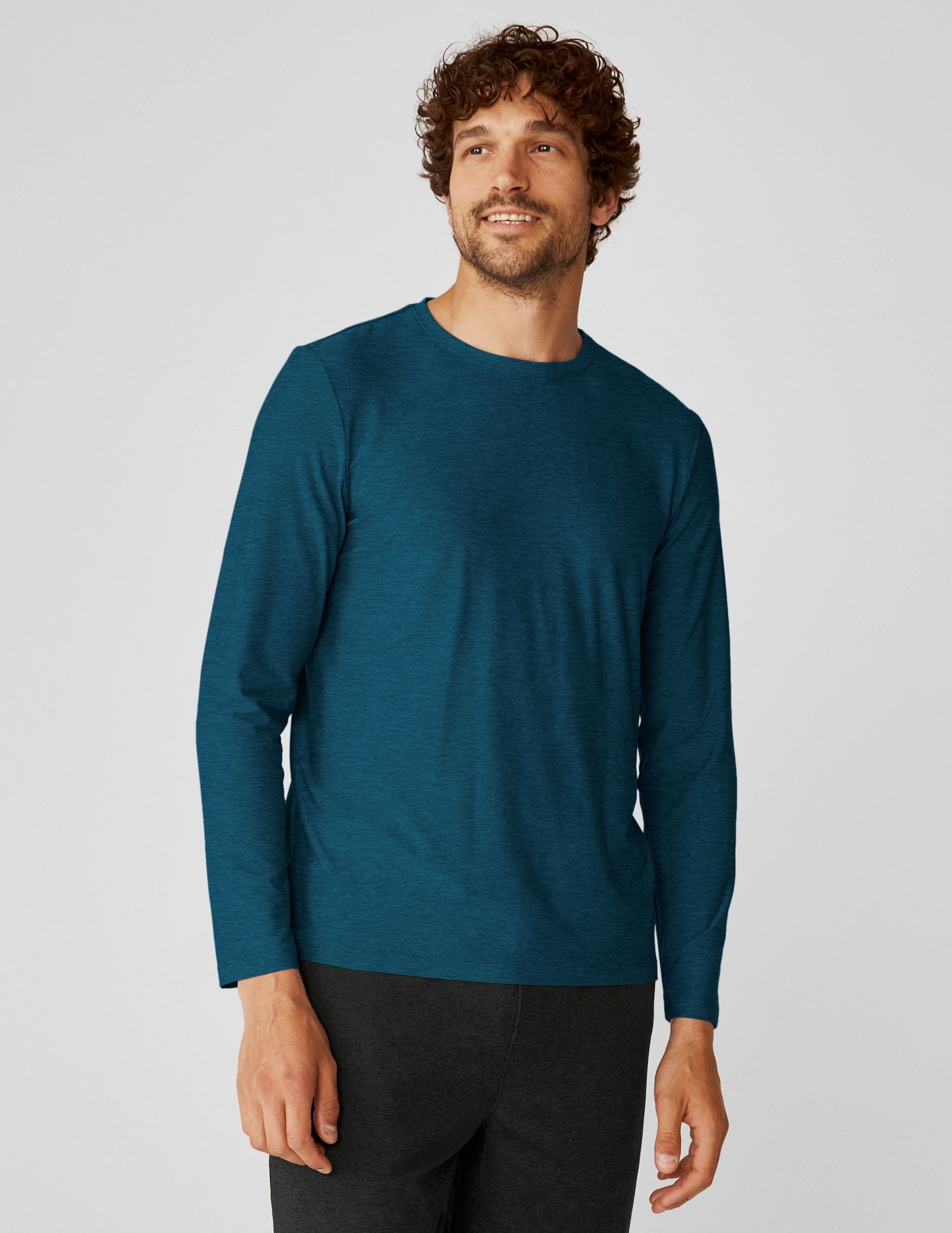 blue men's long sleeve crew neck top.