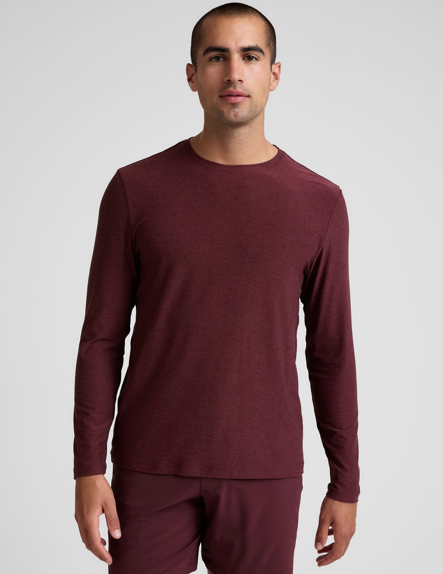 red long sleeve crew neck men's top.