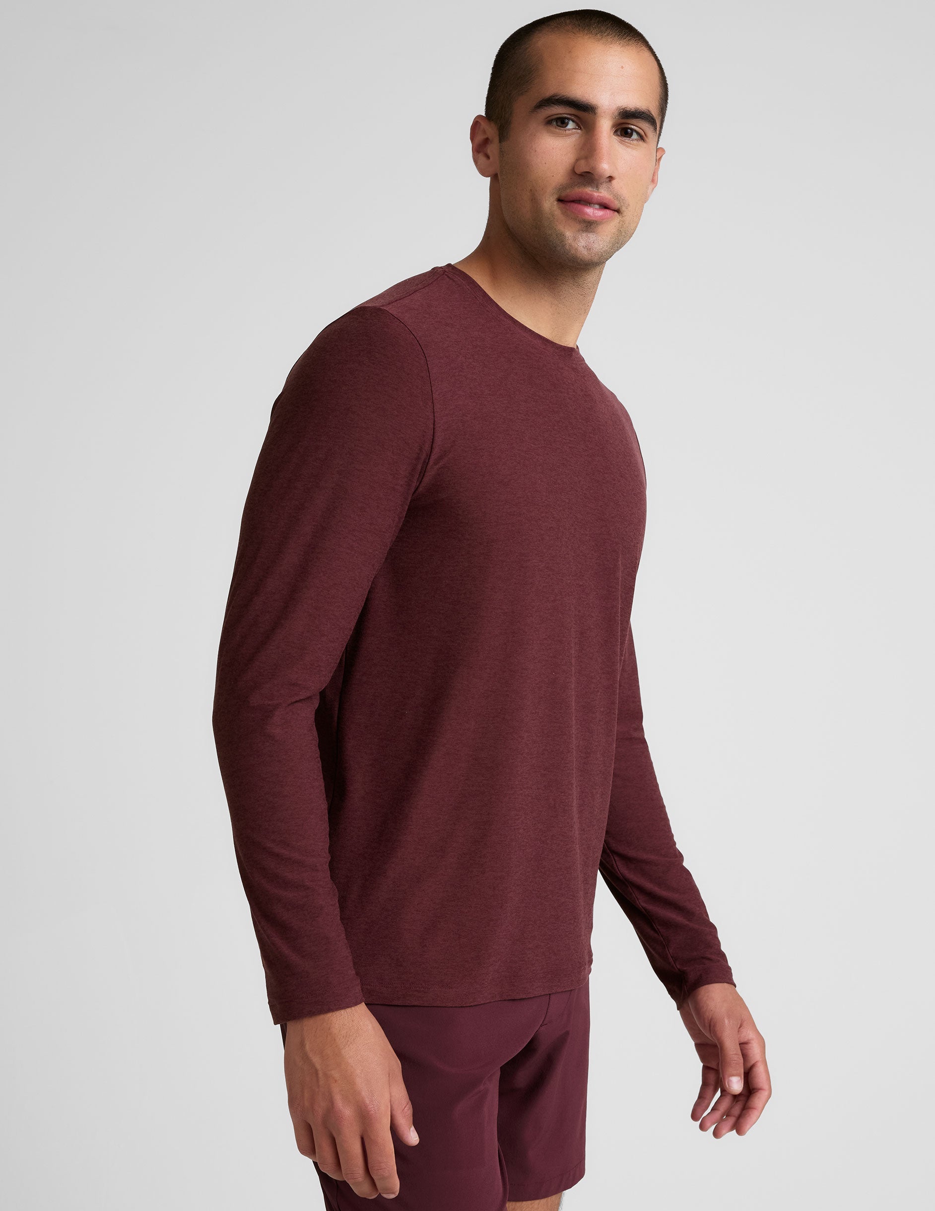 red long sleeve crew neck men's top.