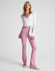 white true wrap top with thumb holes.