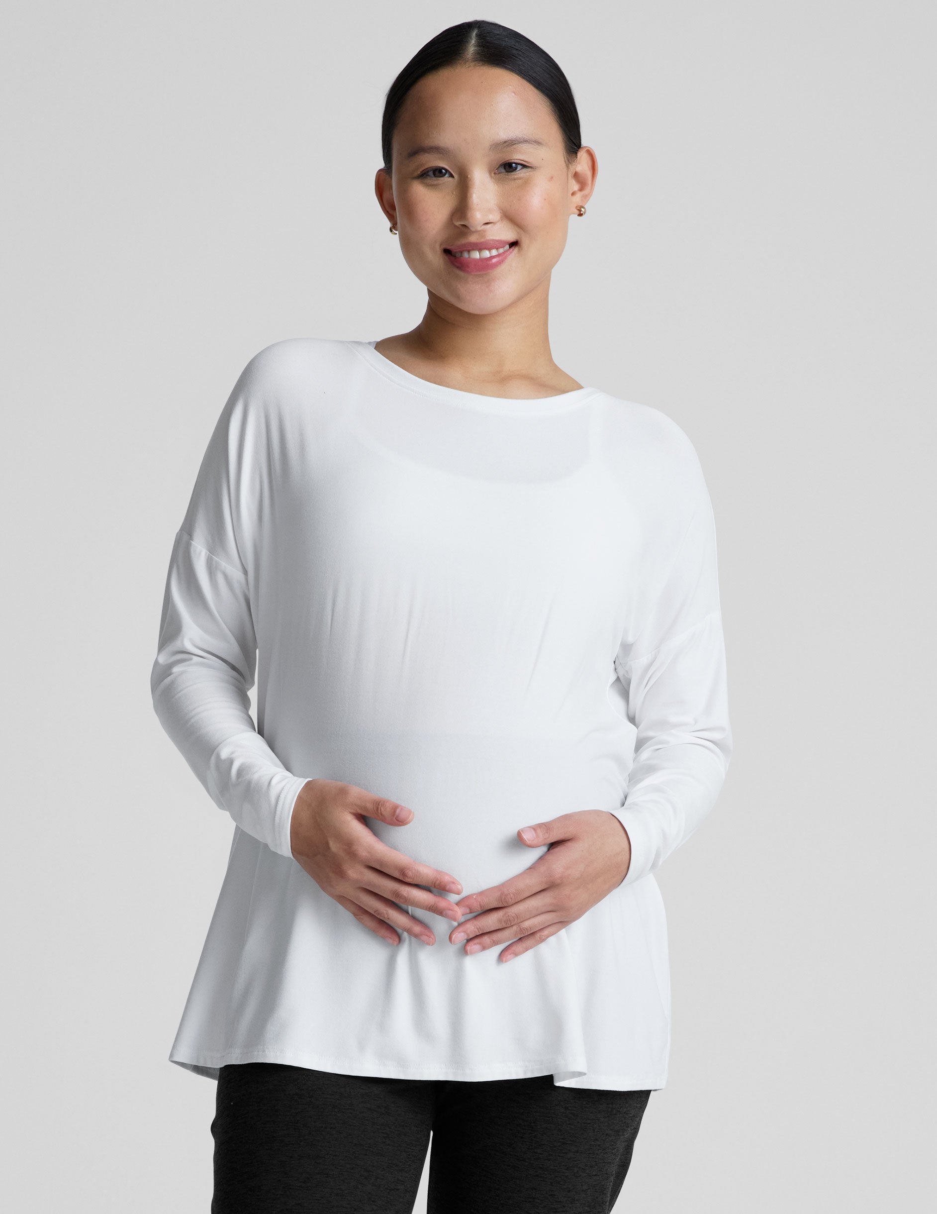 white long sleeve crew neck maternity top.