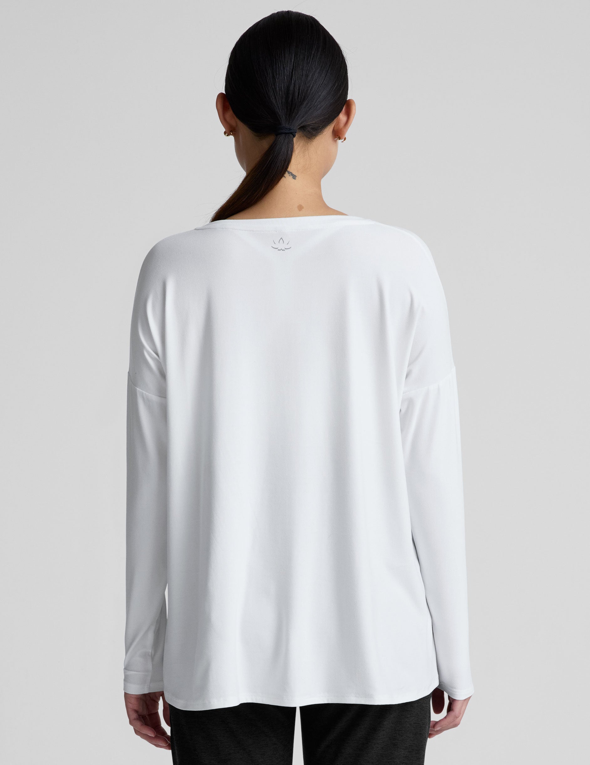 white long sleeve crew neck maternity top.