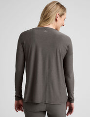 grey crew-neck long sleeve maternity top.