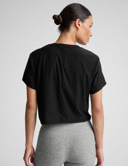 black relaxed fit cropped tee with a scoop neckline.