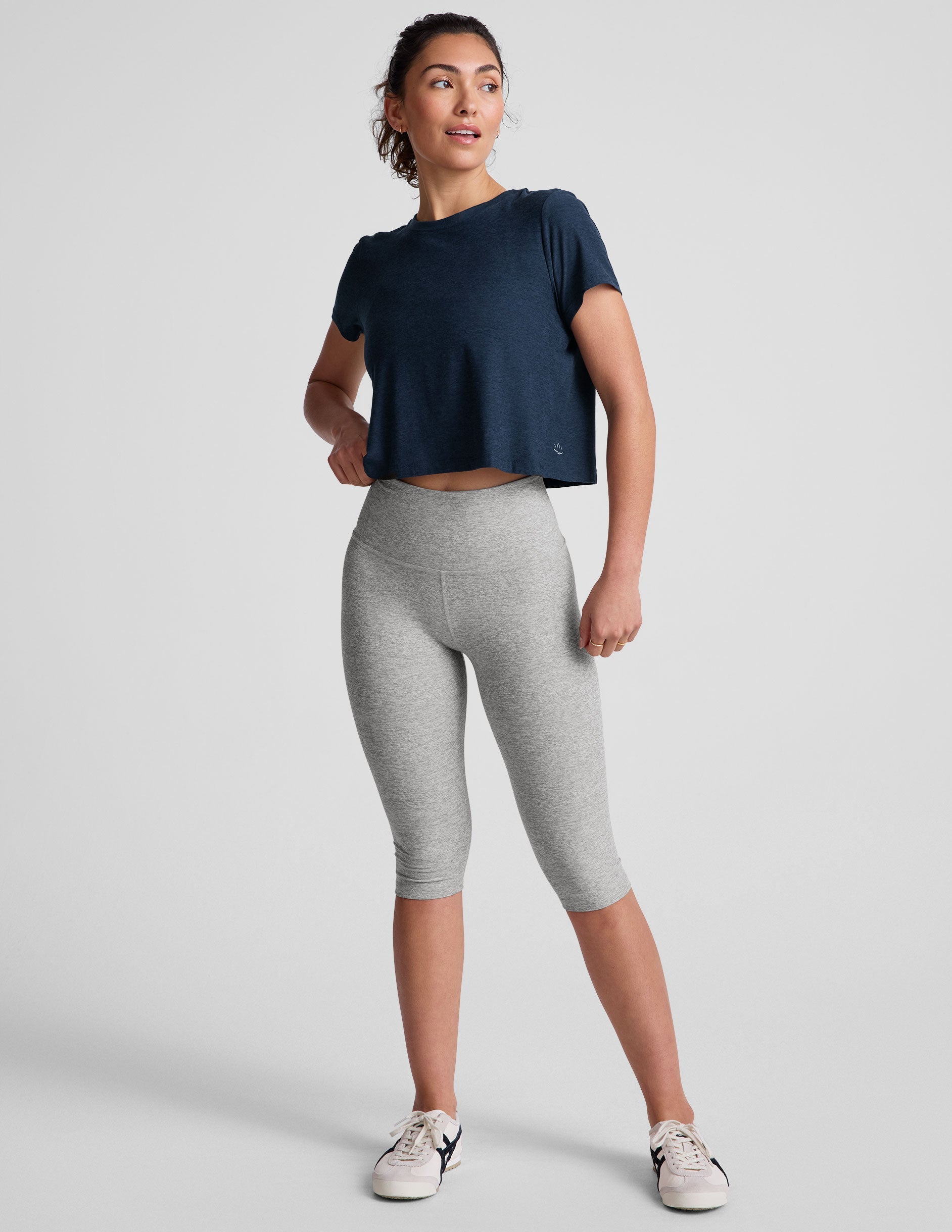 blue short sleeve cropped t-shirt with a scooped neckline.