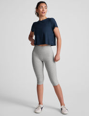 blue short sleeve cropped t-shirt with a scooped neckline.