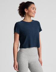blue short sleeve cropped t-shirt with a scooped neckline.