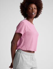 pink cropped short sleeve tee with a scoop neck.