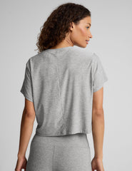 gray short sleeve loose-fitting cropped tee with a scoop neckline.