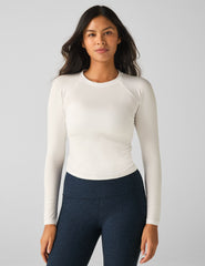 white long sleeve top.