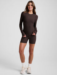 brown crew neck long sleeve with thumb holes.