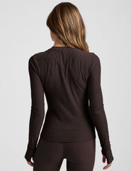 brown crew neck long sleeve with thumb holes.