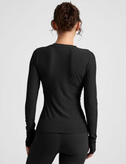 black crew neck long sleeve with thumb holes.