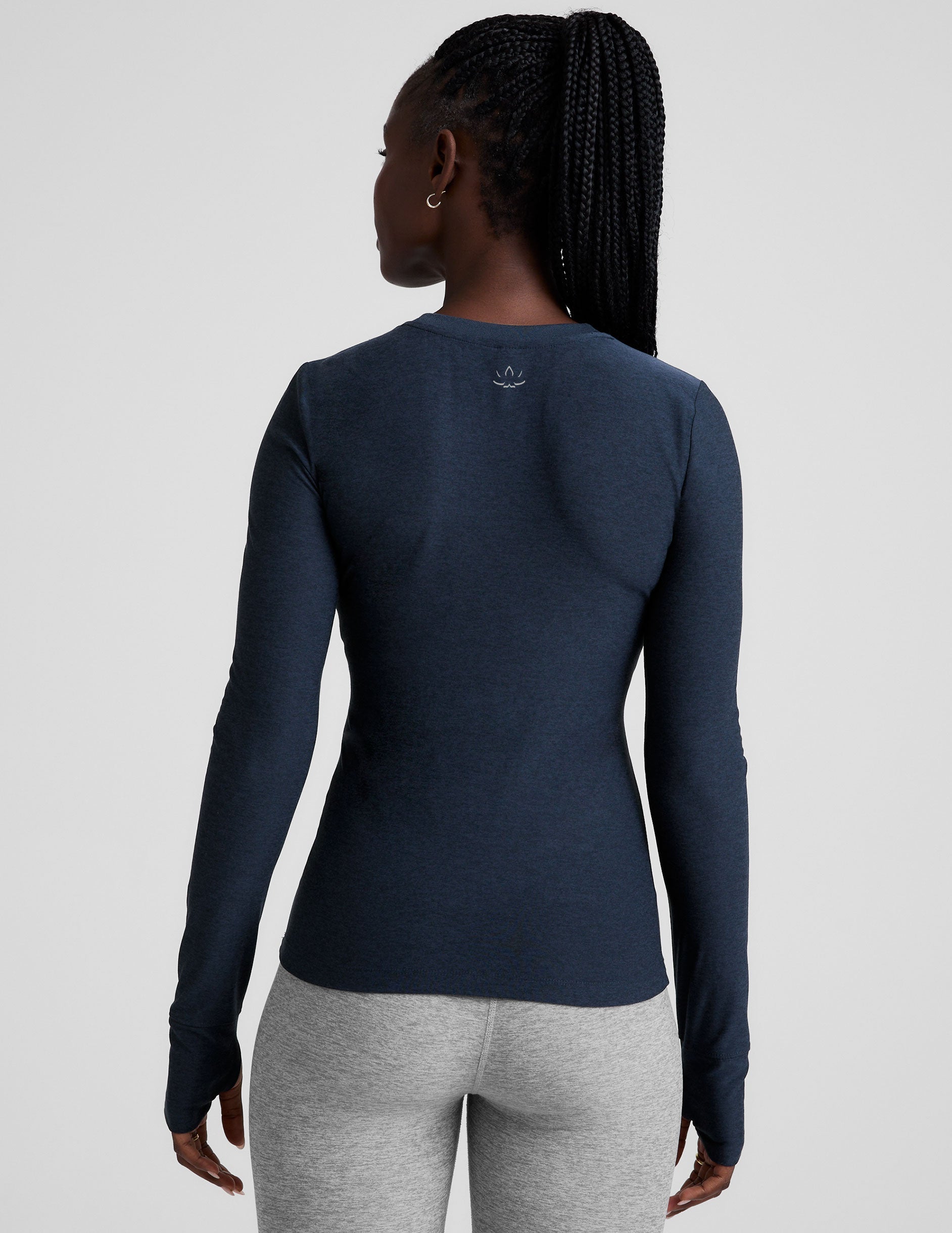 blue crew neck long sleeve with thumb holes.