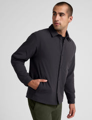 black men's button up insulated jacket with a shirt collar and side seam invisible zipper pockets.