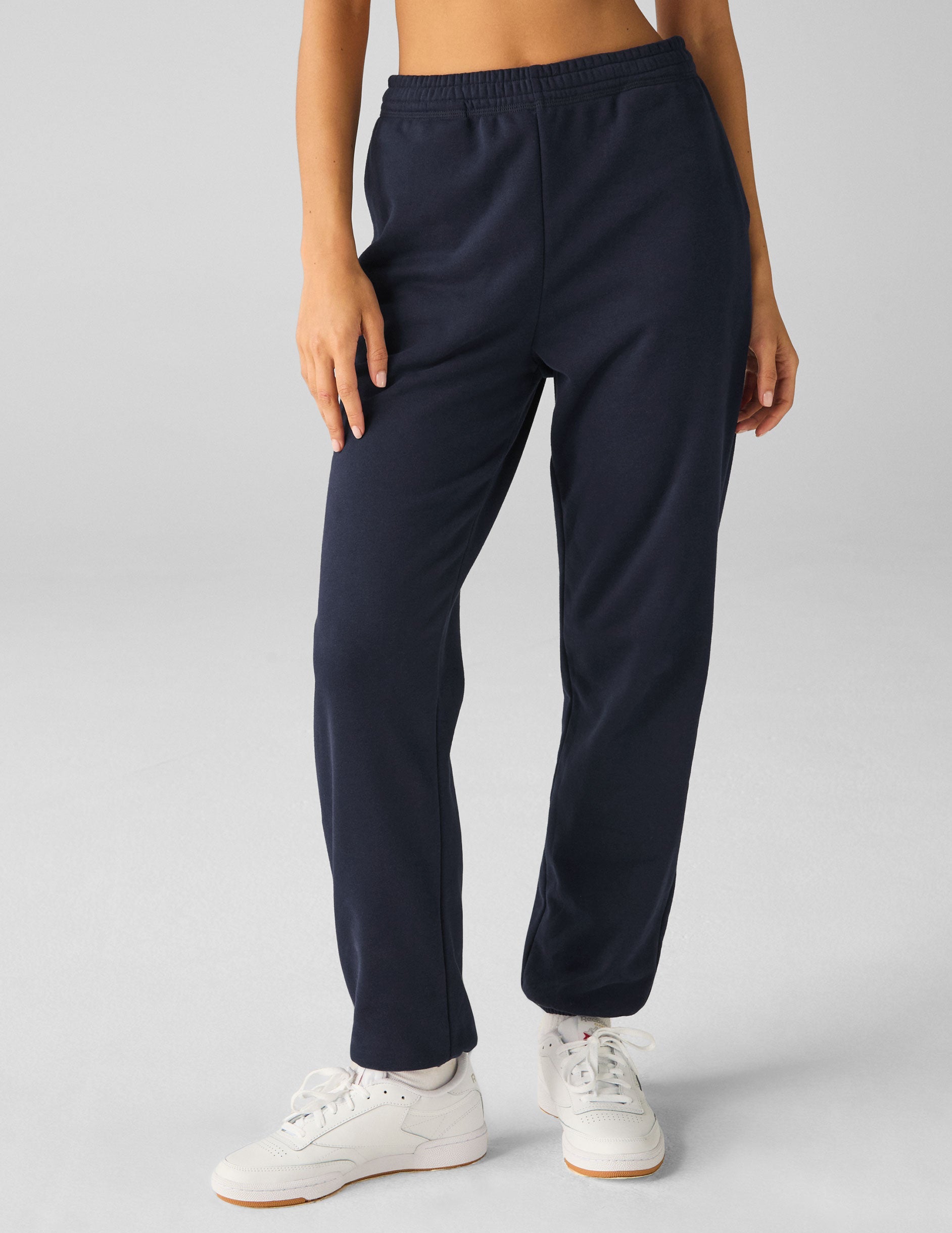 blue jogger style sweatpants with pockets.