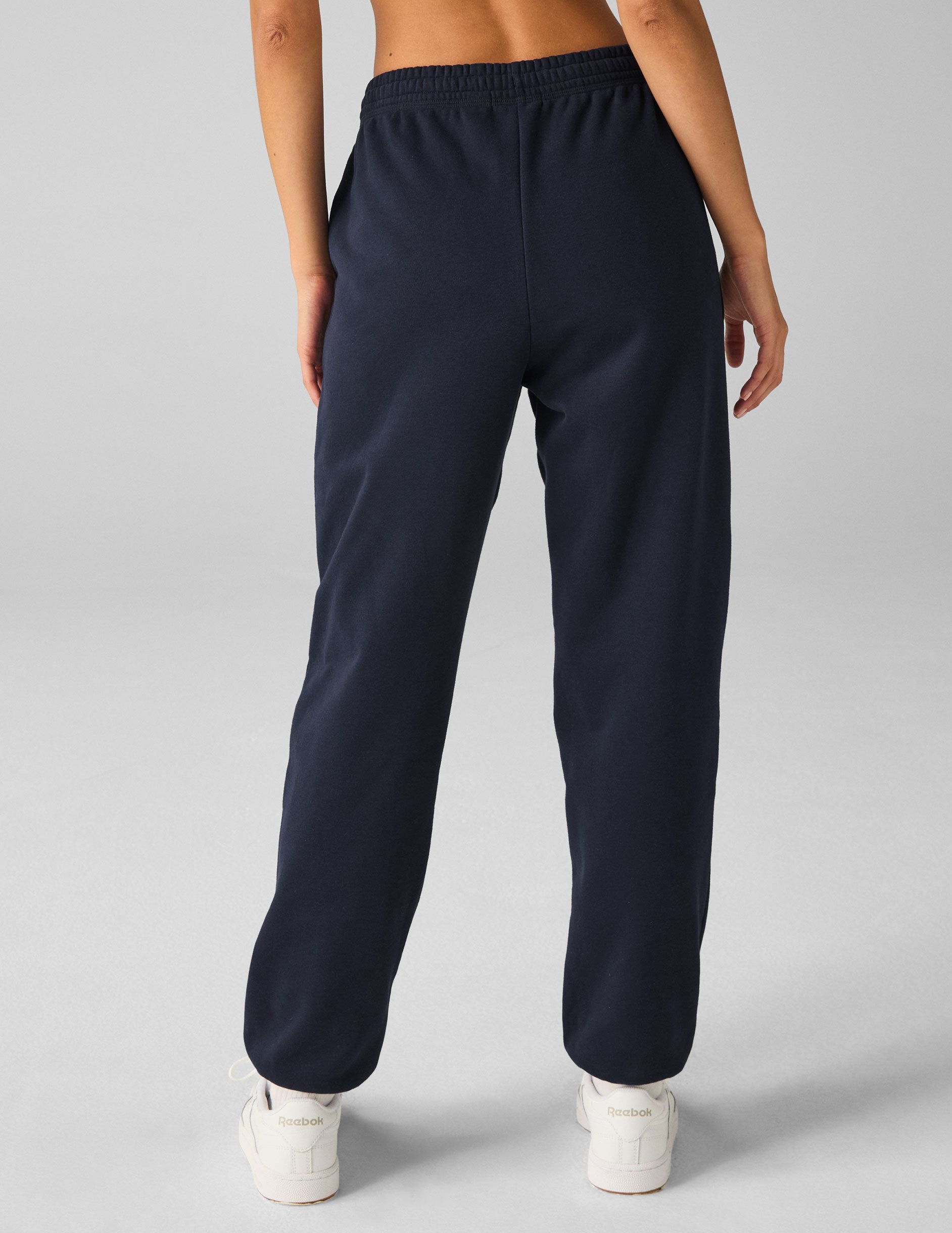 blue jogger style sweatpants with pockets.
