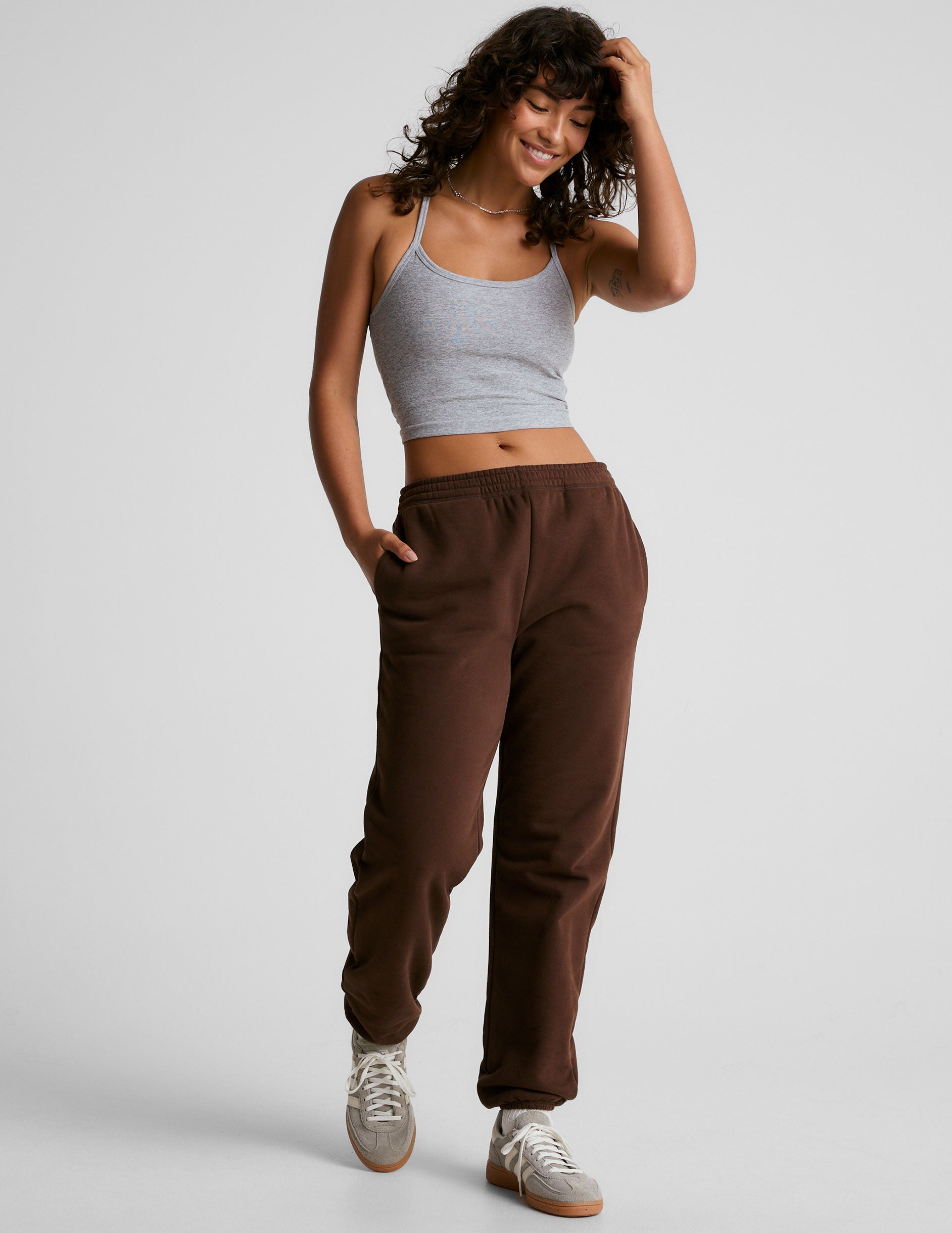 brown jogger style sweatpants with pockets.
