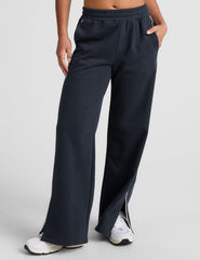 blue sweatpant with a mid rise elasticated waistband and contrast piping trim down sides of leg.