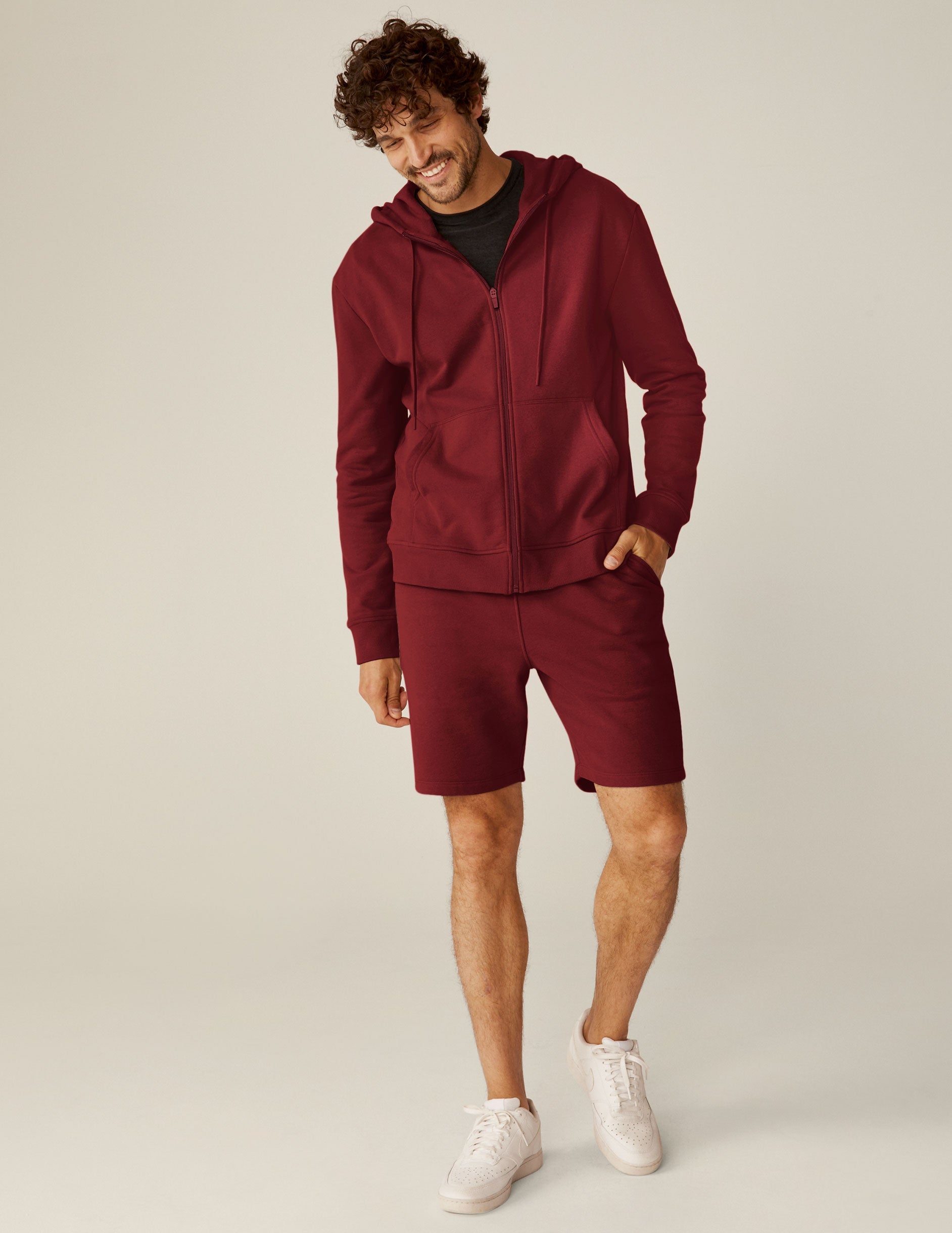 red men's zip-up hooded jacket with pockets.