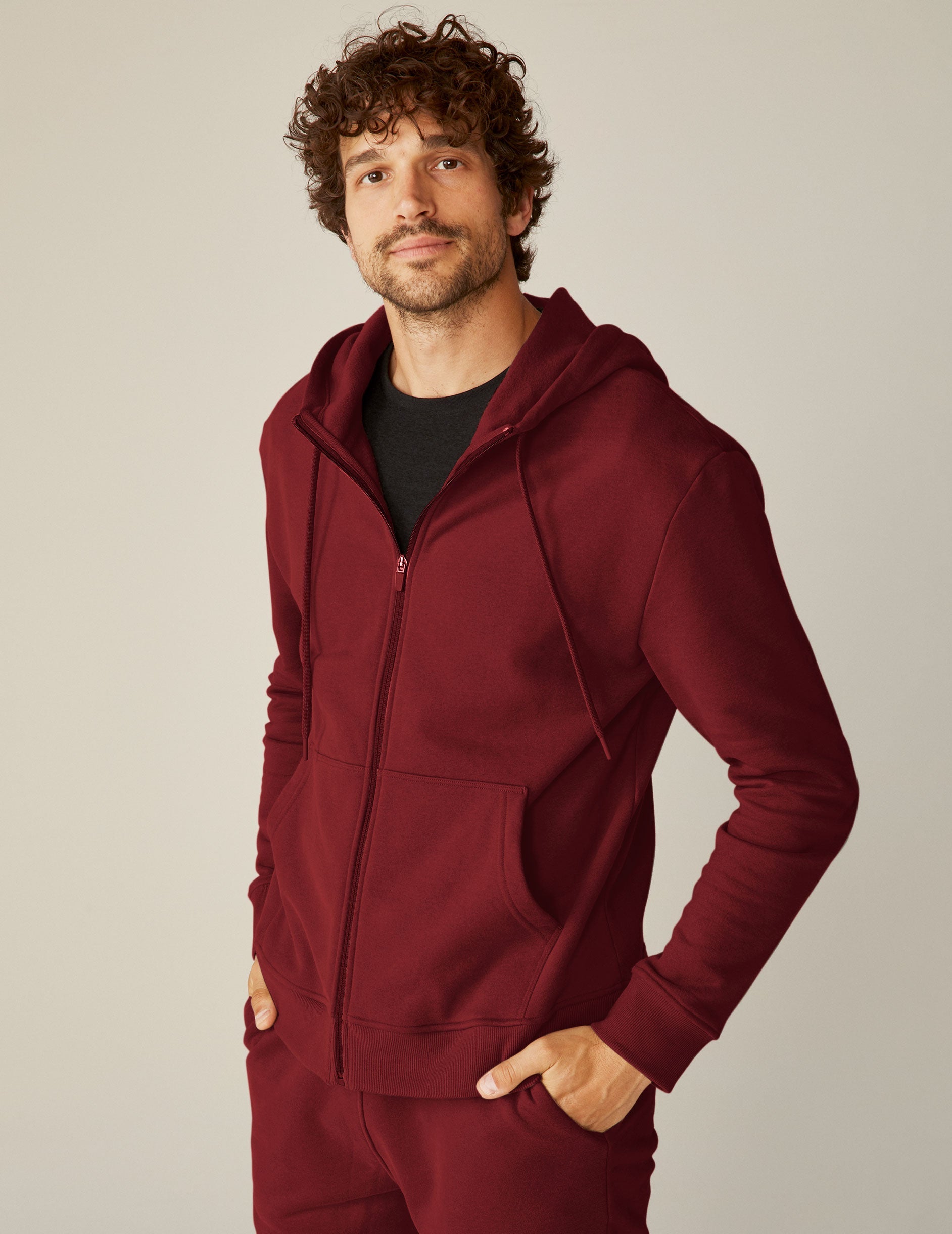 red men's zip-up hooded jacket with pockets.