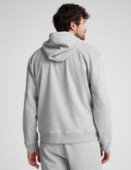gray zip-up hooded jacket with pockets.