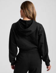 black fleece zip-up jacket with a drawstring hood.