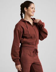 brown fleece zip-up jacket with a drawstring hood.