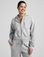 gray fleece zip-up jacket with a drawstring hood.