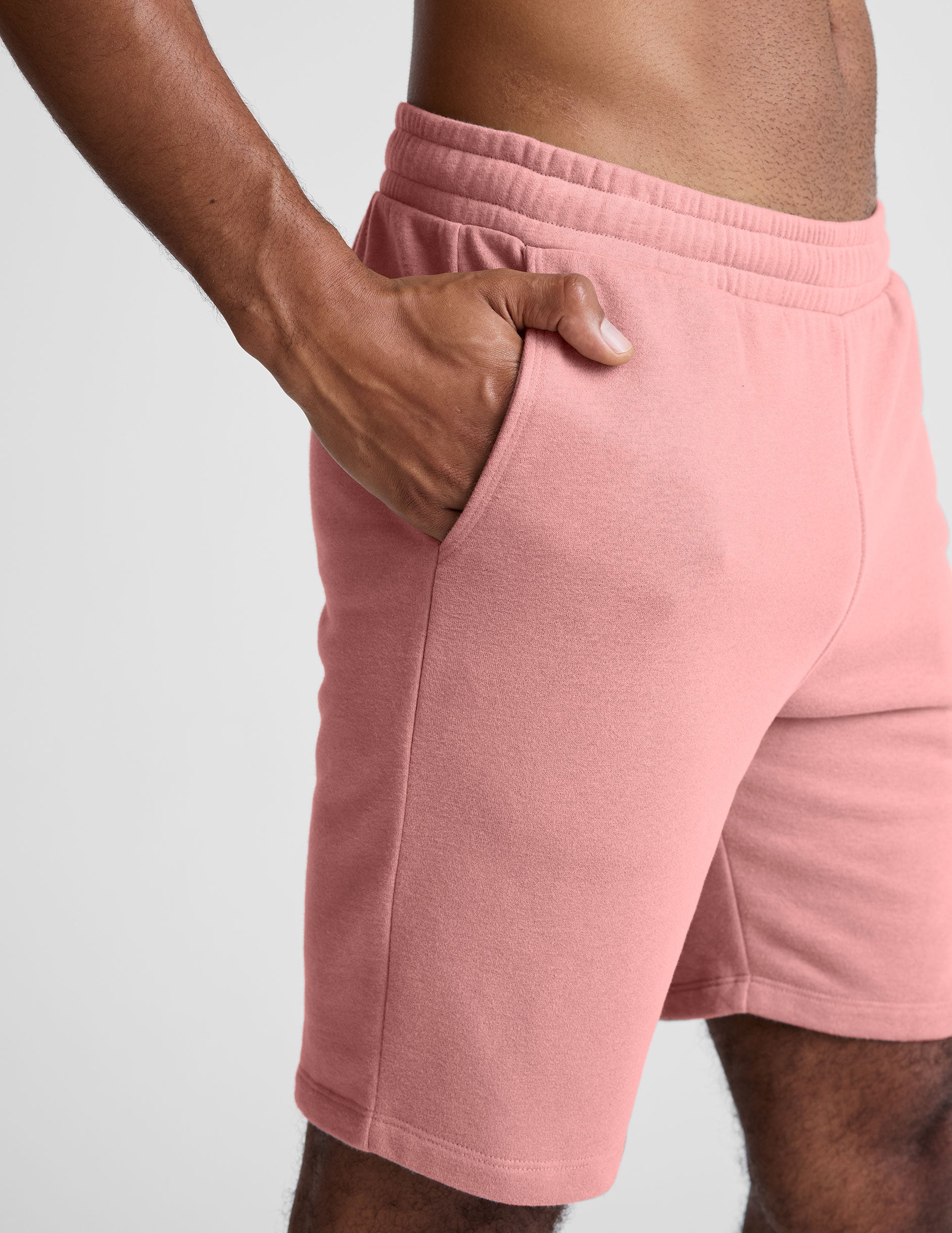 pink men's sweatshorts with pockets.