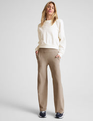 white loose-fitting classic length crew neck sweatshirt.